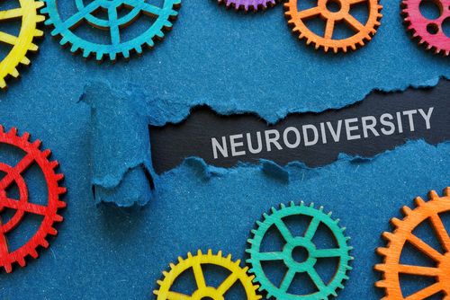 bunte Zahnräder um das Wort "Neurodiversity"