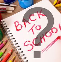 Ein Schreibblock mit dem Text "Back to School" - darübergelegt ein Fragezeichen
