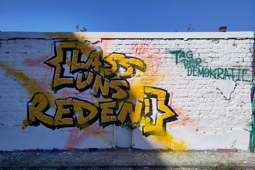 Besprayte Wand: Lass uns reden!